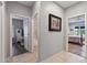 Hallway featuring tile floors and access to the bathroom, bedrooms, and other living spaces at 20450 N Shadow Mountain Dr, Surprise, AZ 85374