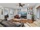 Inviting living room featuring hardwood floors, plush leather seating, and stylish decor for comfortable living at 20450 N Shadow Mountain Dr, Surprise, AZ 85374