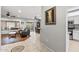 Spacious living area with dining table, leather furniture, and view to outdoor patio at 20450 N Shadow Mountain Dr, Surprise, AZ 85374