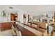 Open concept living and dining room area including travertine flooring and plenty of seating at 2402 E Esplanade Ln # 204, Phoenix, AZ 85016