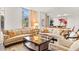 Bright and airy living room with comfortable seating and views of the city at 2402 E Esplanade Ln # 204, Phoenix, AZ 85016