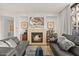 Contemporary living room with a fireplace and comfortable sofas at 2402 E Esplanade Ln # 204, Phoenix, AZ 85016