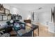 Modern office featuring glass top desk, dark wood elements and bright lighting at 2402 E Esplanade Ln # 204, Phoenix, AZ 85016
