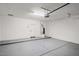 Spacious two car garage with gray floor and white walls at 29228 N 48Th St, Cave Creek, AZ 85331