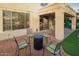 Cozy patio with comfortable seating around a modern fire pit, ideal for enjoying evenings outdoors at 29228 N 48Th St, Cave Creek, AZ 85331