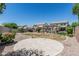 Spacious backyard with a lush lawn, a pool, and a patio, ideal for outdoor activities and relaxation at 3067 E Trigger Way, Gilbert, AZ 85297