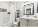 Bright bathroom with white subway tile, modern vanity, and decorative black and white floor tiles at 3067 E Trigger Way, Gilbert, AZ 85297