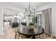 Open-concept floor plan showcasing the dining area, living room, and kitchen at 3067 E Trigger Way, Gilbert, AZ 85297