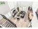 Spacious living room with hardwood floors, high ceilings, and abundant natural light from large windows at 3067 E Trigger Way, Gilbert, AZ 85297