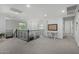 Bright loft with white desk, chair and wrought iron railing at 3067 E Trigger Way, Gilbert, AZ 85297