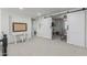 A second floor loft area with desk space, a carpeted floor, and natural light from the windows at 3067 E Trigger Way, Gilbert, AZ 85297