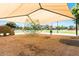 Community playground featuring climbing structures, swings, and shaded area for Gathering fun at 3067 E Trigger Way, Gilbert, AZ 85297
