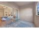 Serene patio with metal seating, view of the main bedroom, and an inviting atmosphere at 3236 E Chandler Blvd # 1076, Phoenix, AZ 85048