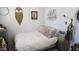 Cozy bedroom features a comfortable bed with decorative pillows and a nightstand with a modern lamp at 3345 E University Dr # 47, Mesa, AZ 85213