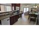 View of the functional kitchen, dining area and living area, creating an inviting space at 3345 E University Dr # 47, Mesa, AZ 85213