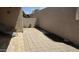 Private outdoor patio with tiled flooring and stucco walls creates a relaxing and secluded space at 3345 E University Dr # 47, Mesa, AZ 85213