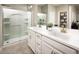 Sleek bathroom featuring a double vanity, modern fixtures, and a spacious glass-enclosed shower, offering a spa-like experience at 3610 E Peralta Canyon Ln, San Tan Valley, AZ 85140
