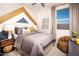 Stylish bedroom with a comfortable bed, modern decor, and ample natural light, creating a relaxing retreat at 3610 E Peralta Canyon Ln, San Tan Valley, AZ 85140