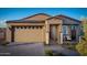 Charming single-story home with a desert landscape, brick driveway, and covered front porch, perfect for relaxing outdoors at 3610 E Peralta Canyon Ln, San Tan Valley, AZ 85140