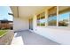 Relax on the covered patio with artificial grass, and easy access through sliding glass doors at 3877 E Oxford Ln, Gilbert, AZ 85295