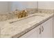 Close-up on bathroom vanity featuring granite countertops and stylish fixtures at 3877 E Oxford Ln, Gilbert, AZ 85295