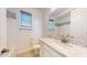 Clean bathroom features a granite countertop, modern faucet, and wood-style vinyl flooring at 3877 E Oxford Ln, Gilbert, AZ 85295