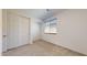Neutral bedroom with closet space, window and soft carpeting at 3877 E Oxford Ln, Gilbert, AZ 85295