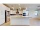 Bright kitchen features a large island and stainless steel appliances at 3877 E Oxford Ln, Gilbert, AZ 85295