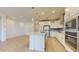 Bright kitchen features a large island, stainless steel appliances, and white cabinets at 3877 E Oxford Ln, Gilbert, AZ 85295
