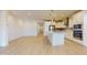 Open concept kitchen features an island, recessed lights and stainless steel appliances at 3877 E Oxford Ln, Gilbert, AZ 85295