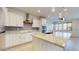 Beautiful modern kitchen with granite countertops, stainless steel appliances, and ample cabinet space at 3877 E Oxford Ln, Gilbert, AZ 85295