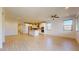 Spacious open concept living area and kitchen with wood flooring and natural light at 3877 E Oxford Ln, Gilbert, AZ 85295