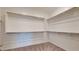 Spacious walk-in closet with ample shelving and clothing rods for organization at 3877 E Oxford Ln, Gilbert, AZ 85295