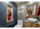 Stylish half bathroom with unique vessel sink and designer accents at 401 N Cholla St, Chandler, AZ 85224