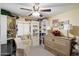 Inviting bedroom featuring a murphy bed, built-in shelving, and a bright window with a cozy seat at 401 N Cholla St, Chandler, AZ 85224