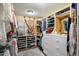 Well-organized walk-in closet with ample shelving and storage solutions at 401 N Cholla St, Chandler, AZ 85224