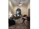 Cozy living room featuring an arched window, ceiling fan and stylish furnishings at 401 N Cholla St, Chandler, AZ 85224