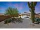 The private backyard features desert landscaping and a covered patio at 4045 E Desert Marigold Dr, Cave Creek, AZ 85331