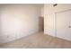 Guest bedroom with neutral carpet, closet, and bright natural light at 4045 E Desert Marigold Dr, Cave Creek, AZ 85331