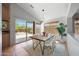 Eat-in kitchen with a dining area and sliding glass doors to the outdoor patio at 4045 E Desert Marigold Dr, Cave Creek, AZ 85331
