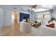 Bright living room featuring tile floors, vaulted ceilings, and views into the kitchen at 4045 E Desert Marigold Dr, Cave Creek, AZ 85331