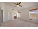 Bright main bedroom with neutral carpet, large windows with wood trim, and views to the exterior at 4045 E Desert Marigold Dr, Cave Creek, AZ 85331