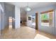 Open floor plan with a kitchen and sliding glass doors to the outdoor patio at 4045 E Desert Marigold Dr, Cave Creek, AZ 85331