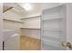 Walk-in closet with built-in shelving, drawers, and hanging storage, offering ample space at 4045 E Desert Marigold Dr, Cave Creek, AZ 85331