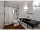 Updated bathroom featuring subway tile shower and modern black vanity at 4142 N 35Th St, Phoenix, AZ 85018