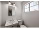 Charming bathroom with classic fixtures, white walls, and natural light at 4142 N 35Th St, Phoenix, AZ 85018
