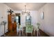 Dining room showcasing a vintage light fixture and a classic dining set for stylish entertaining at 4142 N 35Th St, Phoenix, AZ 85018