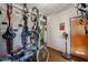 Eclectic hobby room with vintage decor, bicycles, and refinished concrete floors at 4142 N 35Th St, Phoenix, AZ 85018