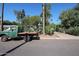 Street view showcasing a vintage pickup truck with mature landscaping and trees in a suburban setting at 4142 N 35Th St, Phoenix, AZ 85018
