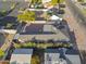 Aerial view of property displaying mature trees, neighboring homes, and street access at 432 W 1St St, Mesa, AZ 85201